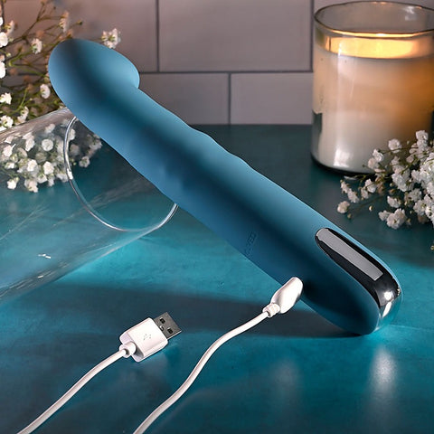 QUEEN OF ALL TRADES Thrusting Dildo Vibrator by Evolved